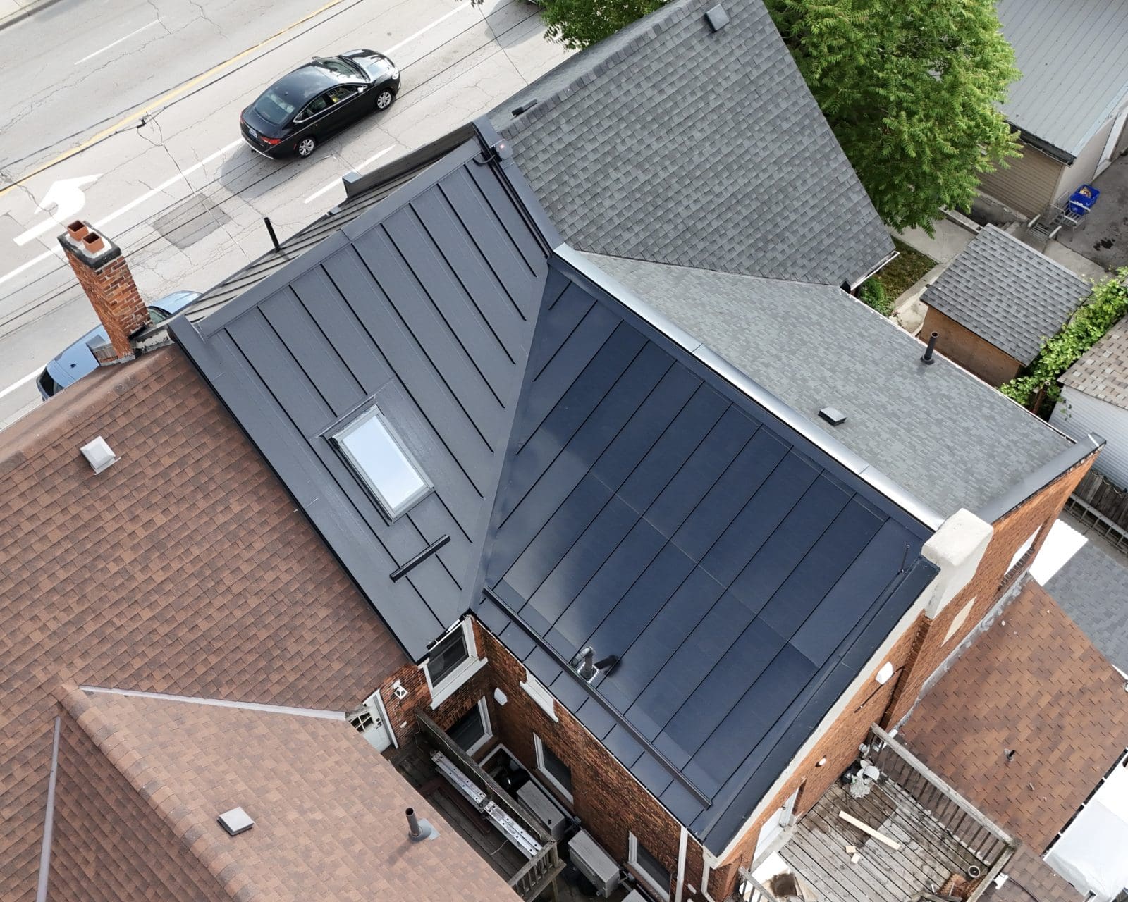 Completed standing seam metal roof installation by Shift